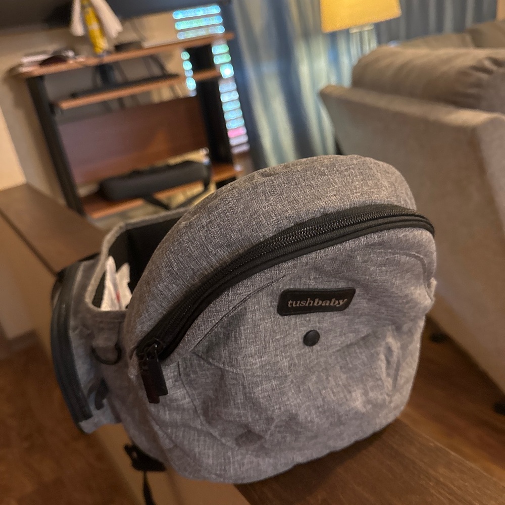 tushbaby Gray Toddler Ride-On Bag – Compact Kids Accessory